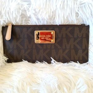 Pre-loved  Michael Kors Brown  with Goldtone logo
